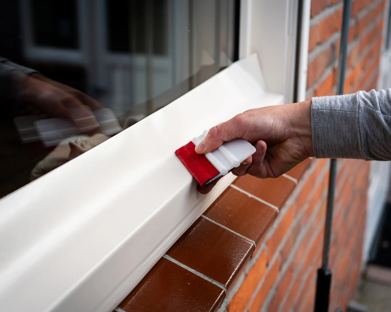 monteur renolit folie aanbrengen kunststof kozijn